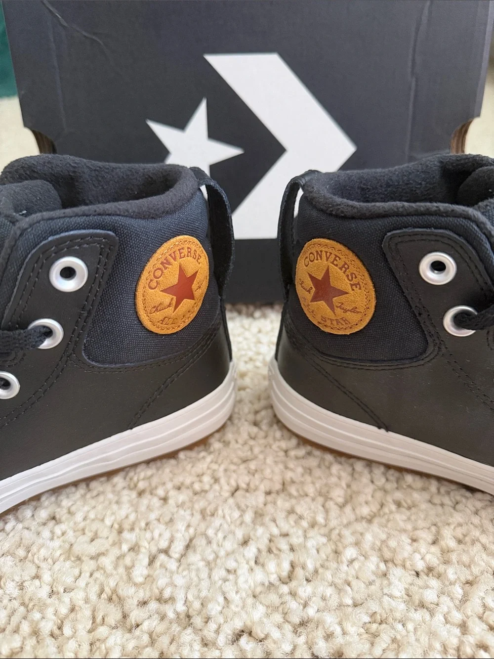 Converse Kids' Black High-Top leather sneakers